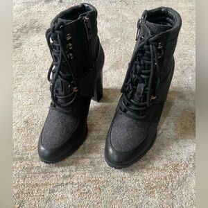 Antonio Melani lace up boots in black color. Size 6 about 3 inches heel